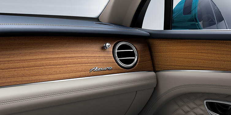 Bentley Busan Bentley Bentayga Extended Wheelbase Azure front dash showing Open Pore Koa veneer surrounded by Portland and Imperial Blue hides
